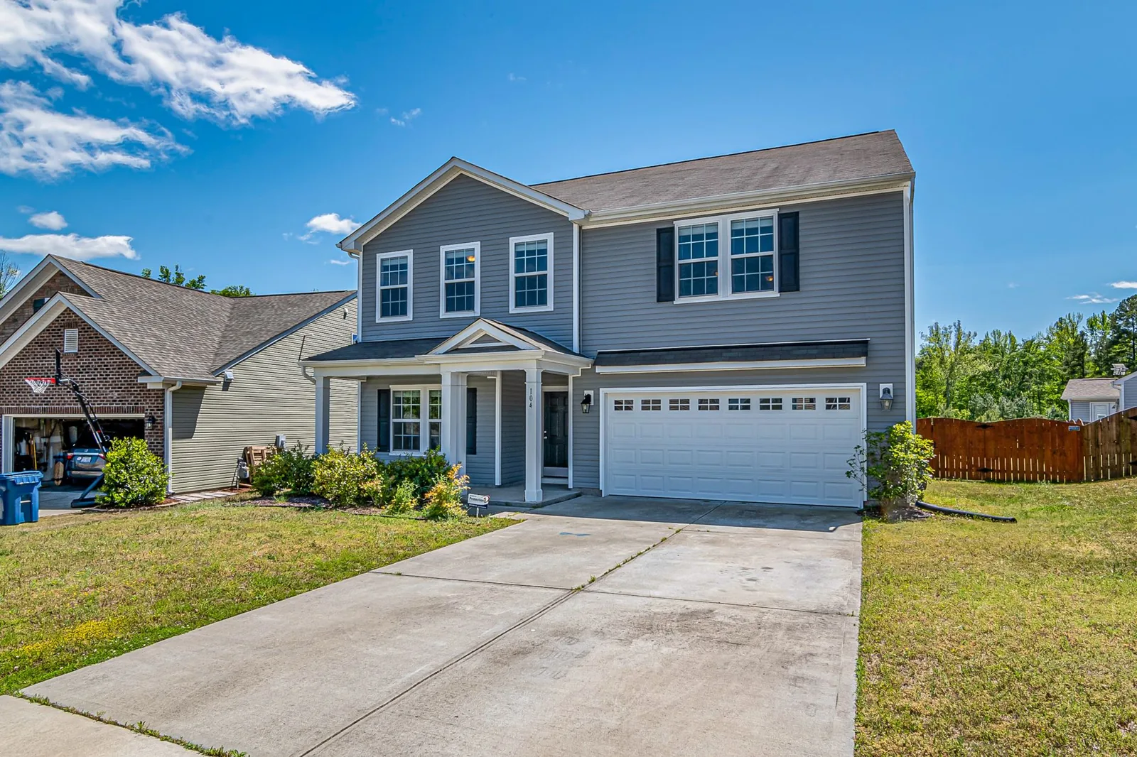 Detached garage vs attached garage cost comparison on a two-car build