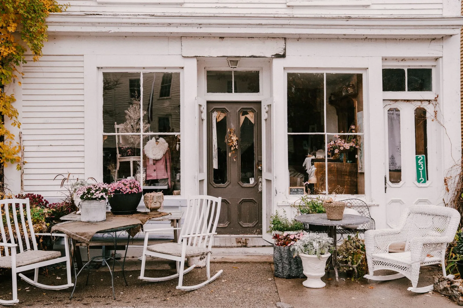 Front porch decorating ideas with planters and a welcoming door