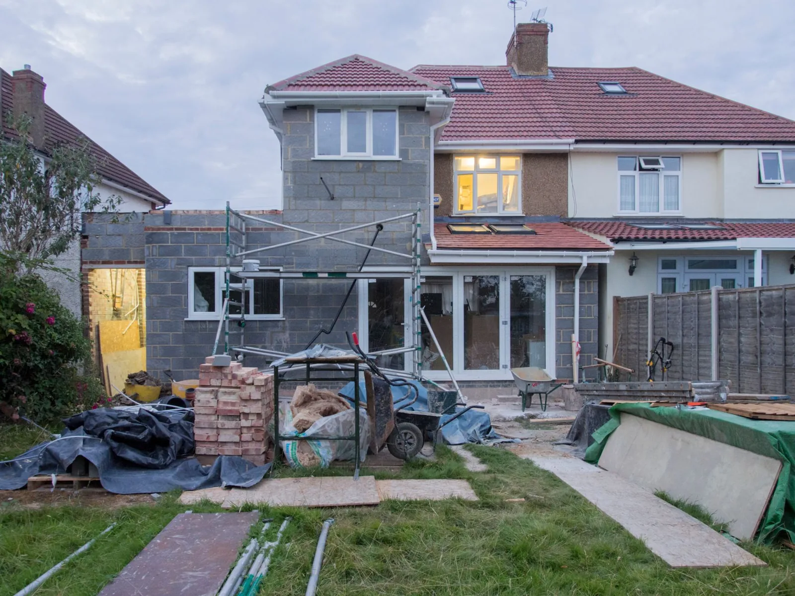 Porch addition cost varies widely by materials, size, and roof style before you build