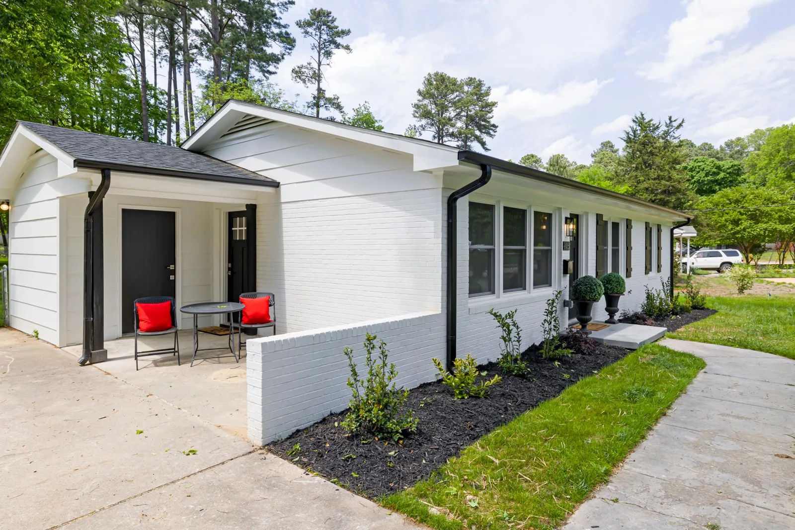 Detached garage with apartment cost - framing and second-story living space under construction
