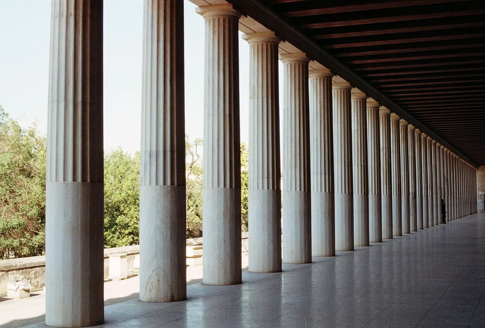 Portico Cost: completed brick portico with columns at a home entrance